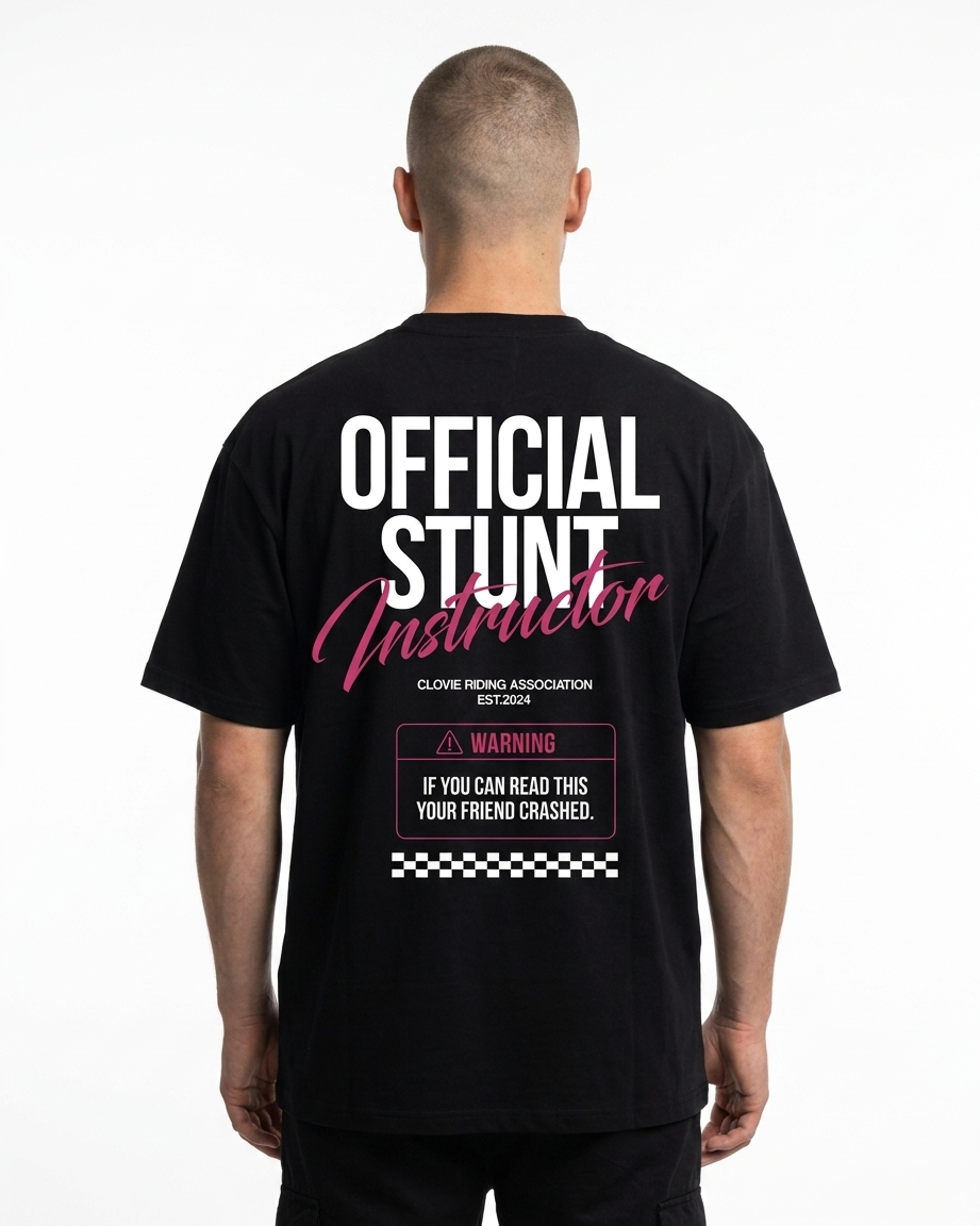 Official Stunt Instructor Oversized Tee — Back view mit OFFICIAL STUNT Instructor + Warning-Detail