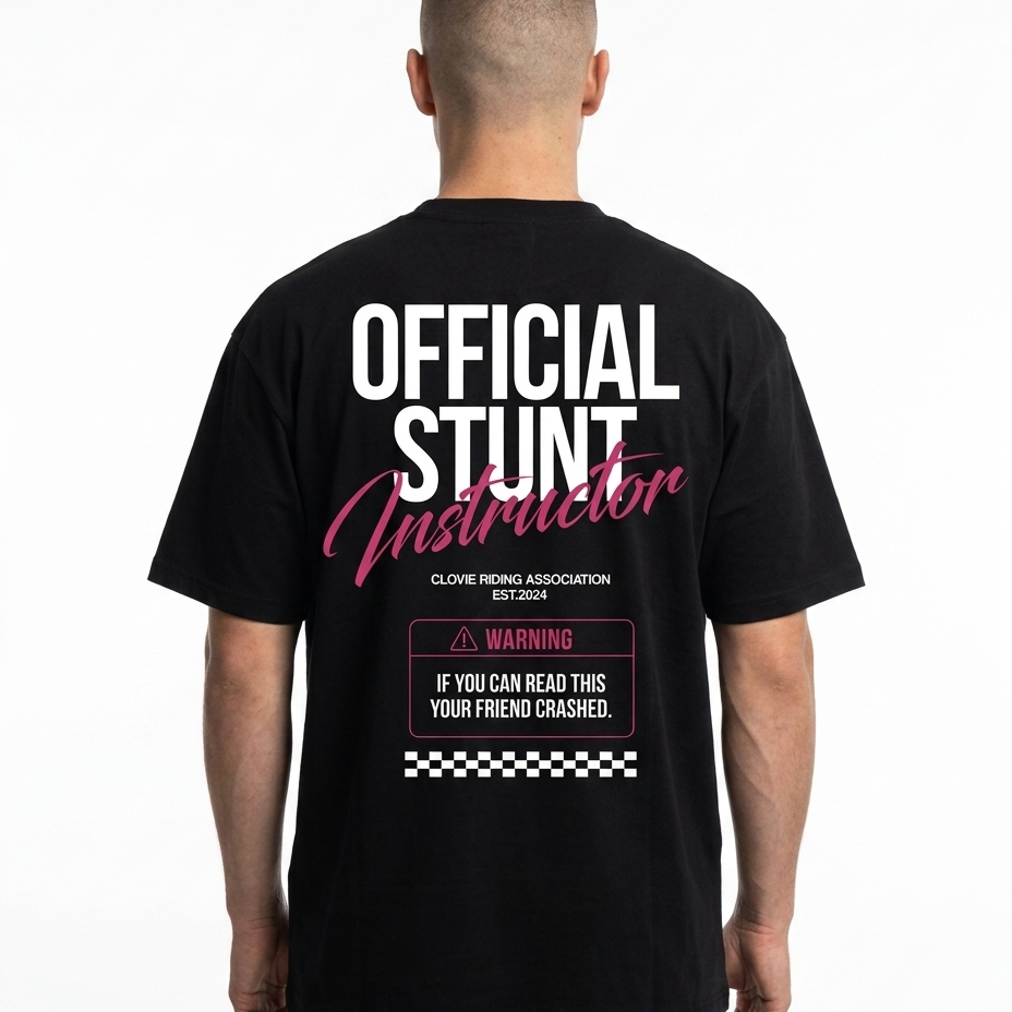Official Stunt Instructor Oversized Tee — Back view mit OFFICIAL STUNT Instructor + Warning-Detail