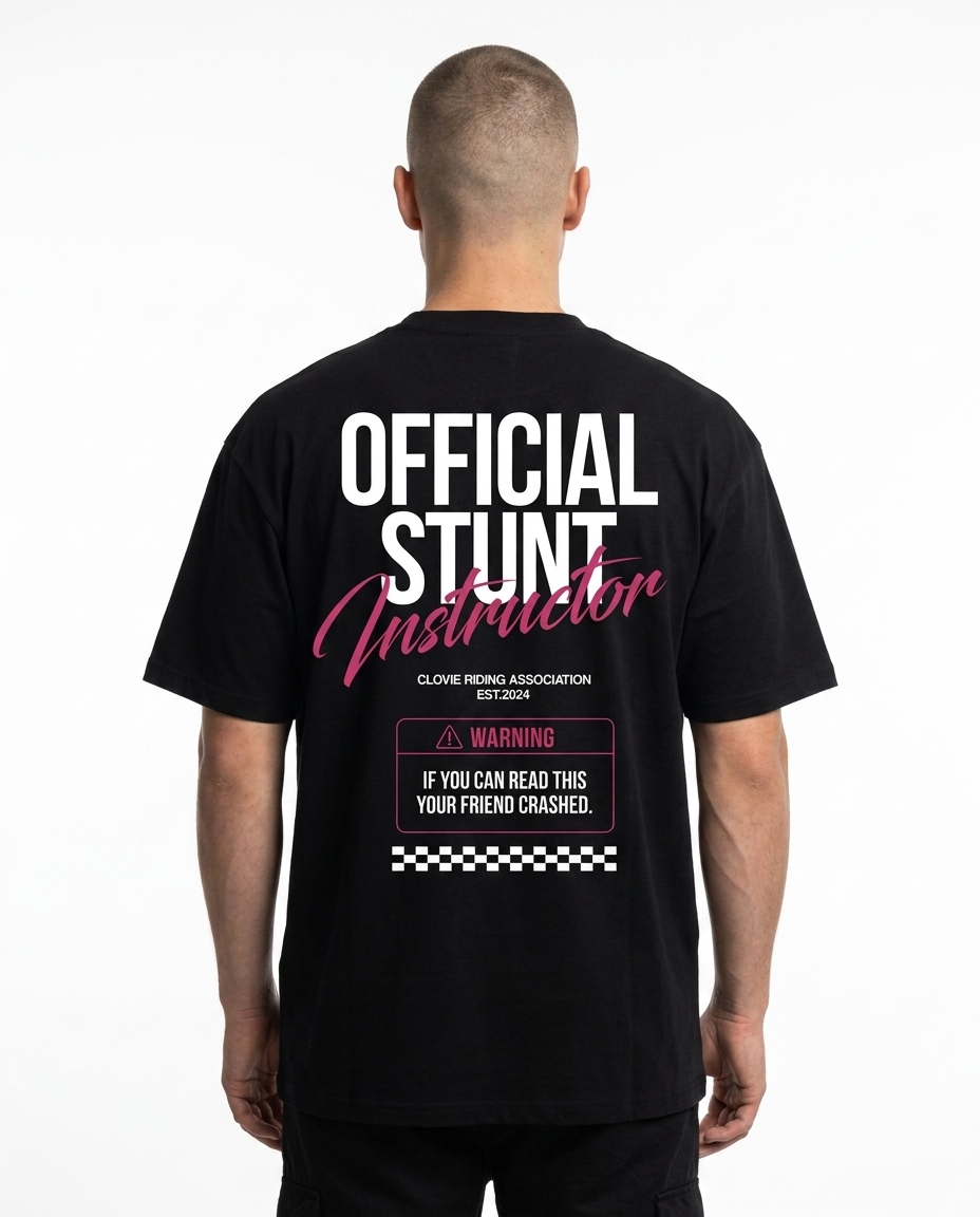 Official Stunt Instructor Oversized Tee — Back view mit OFFICIAL STUNT Instructor + Warning-Detail