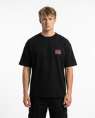 Official Stunt Instructor Oversized Tee — Front view mit CLOVIE Stunt Division Brust-Print