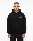 Official Stunt Instructor Oversized Hoodie — Front view mit kleinem CLOVIE Stunt Division Brust-Print