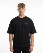 Raised by the streets OVS Tee Black - model front CLOVIE (reuse altes Sister)