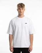 Raised by the streets OVS Tee White - model front CLOVIE (reuse altes Sister)