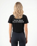 Social media killed romance Cropped Tee Black - female model back print