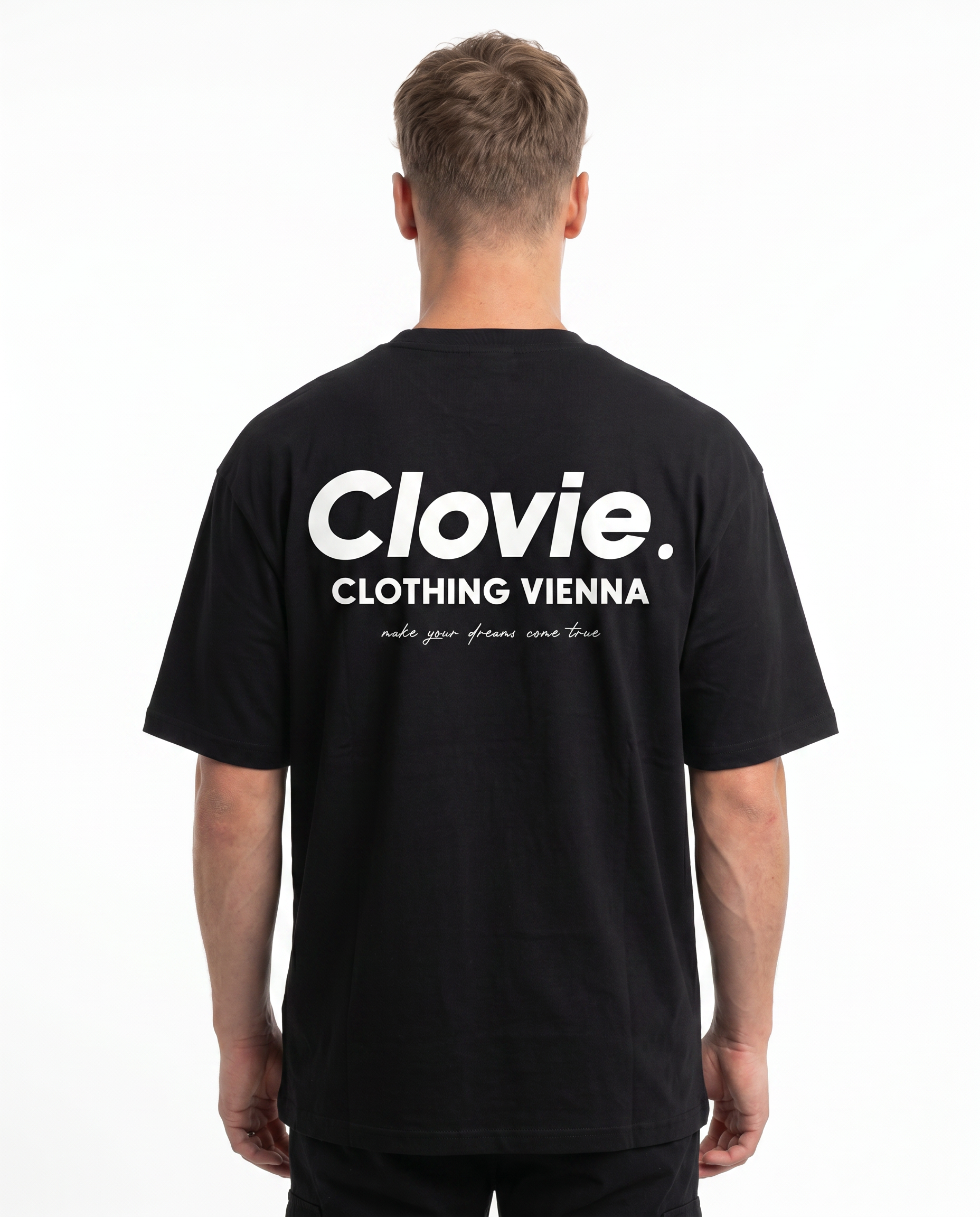 Make your dreams come true OVS Tee Black - model back print (v4 - print position raised per Daniel 2026-06-21)