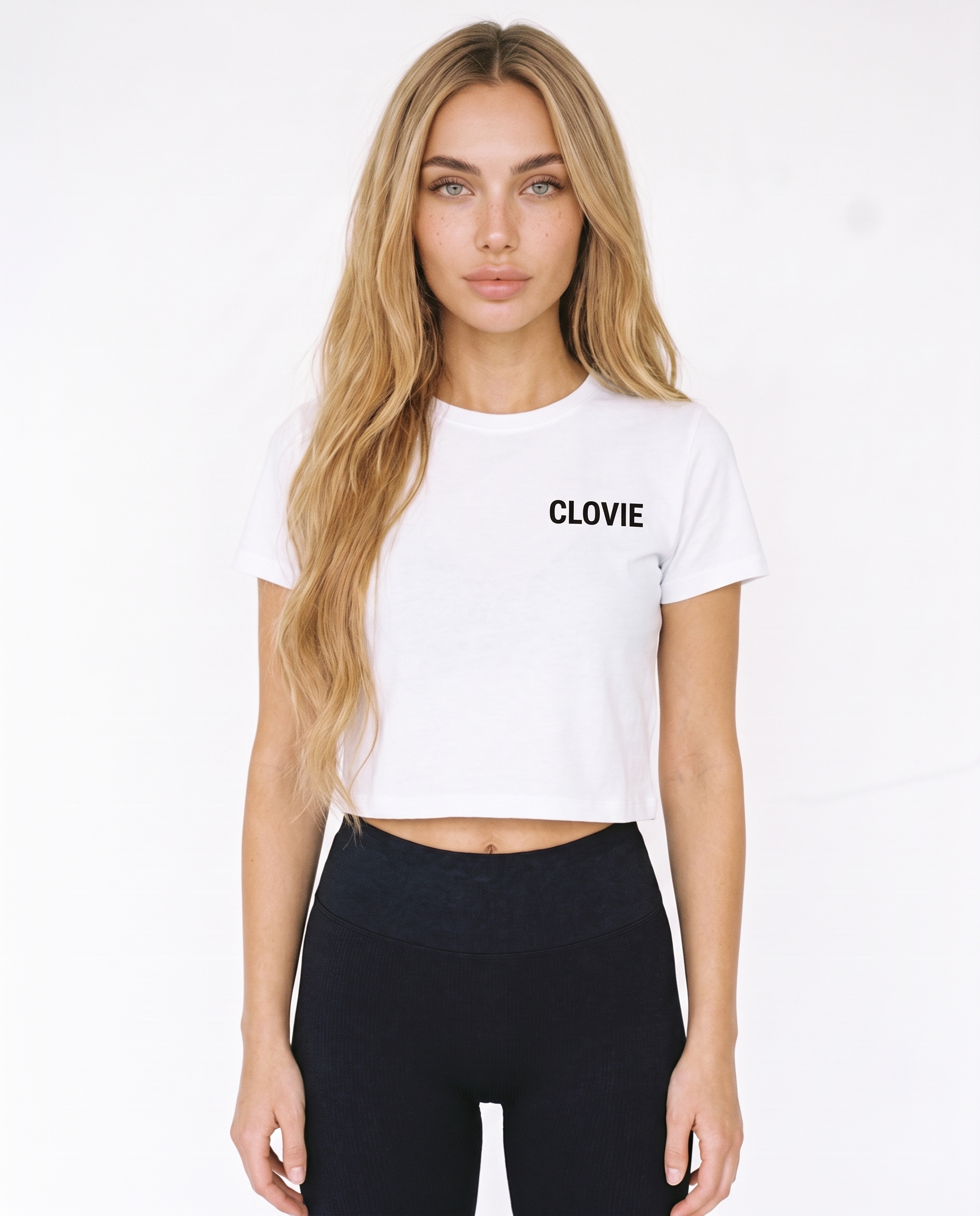I spent all my money on racing Cropped Tee White - female model front + CLOVIE chest logo
